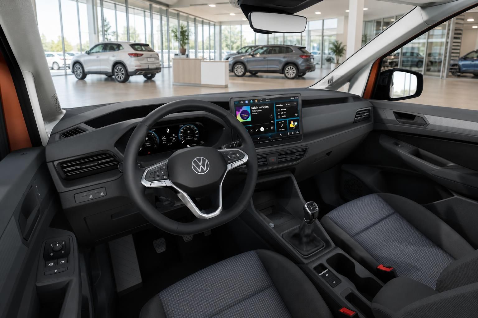 VW Caddy Innenraum Cockpit mit Lenkrad und Digital Infotainment System