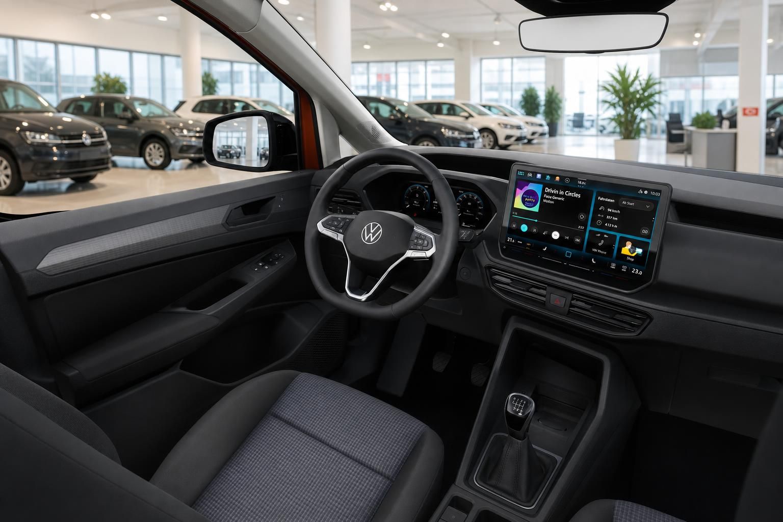 VW Caddy Fahrerraum mit Lenkrad Schaltung und Touchscreen Navigationssystem