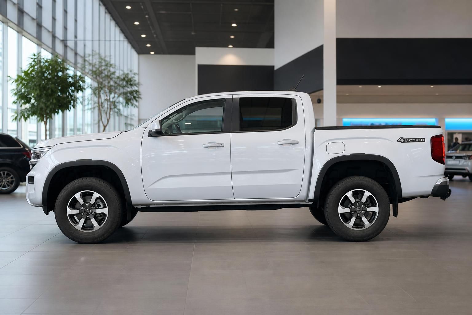 VW Amarok 4Motion weiß Seitenansicht Pickup im Showroom