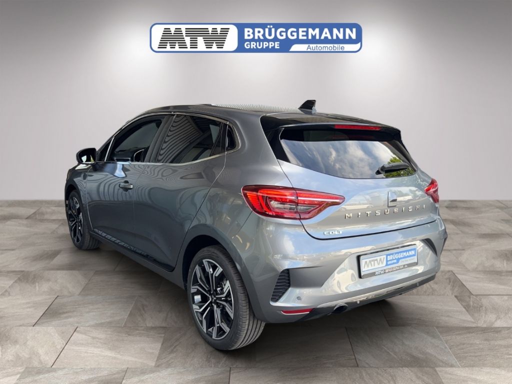 Mitsubishi Colt grau Seitenansicht schräg von hinten