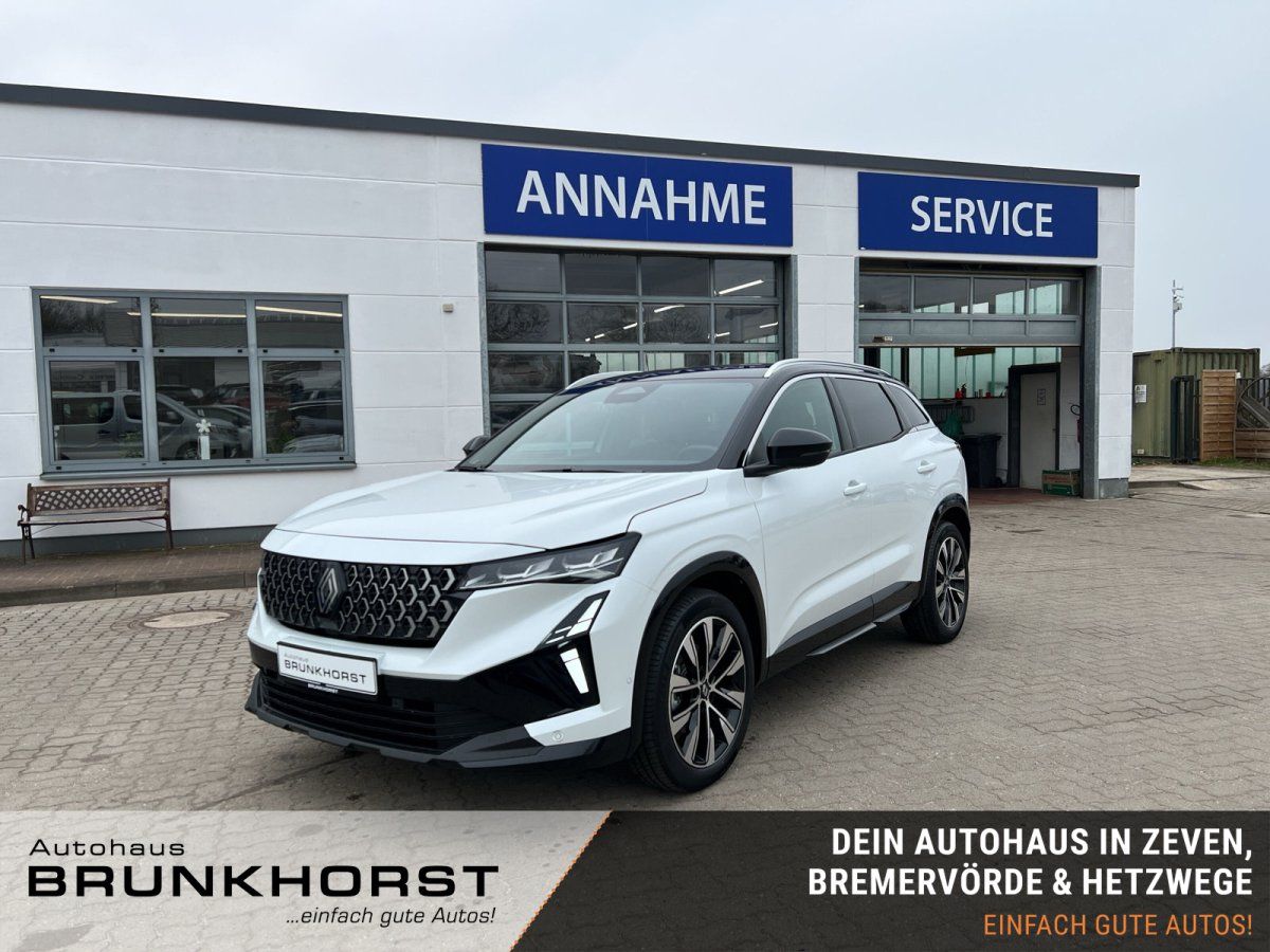 Renault Austral SUV weiß im Autohaus-Showroom - Frontansicht mit schwarzem Dach und Kühlergrill