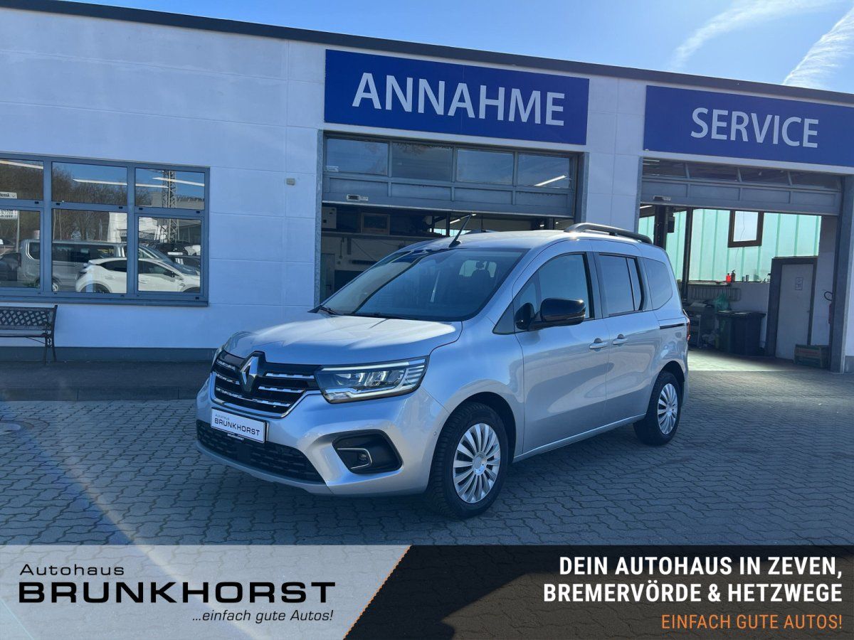Renault Kangoo silber in modernem Autohaus-Showroom