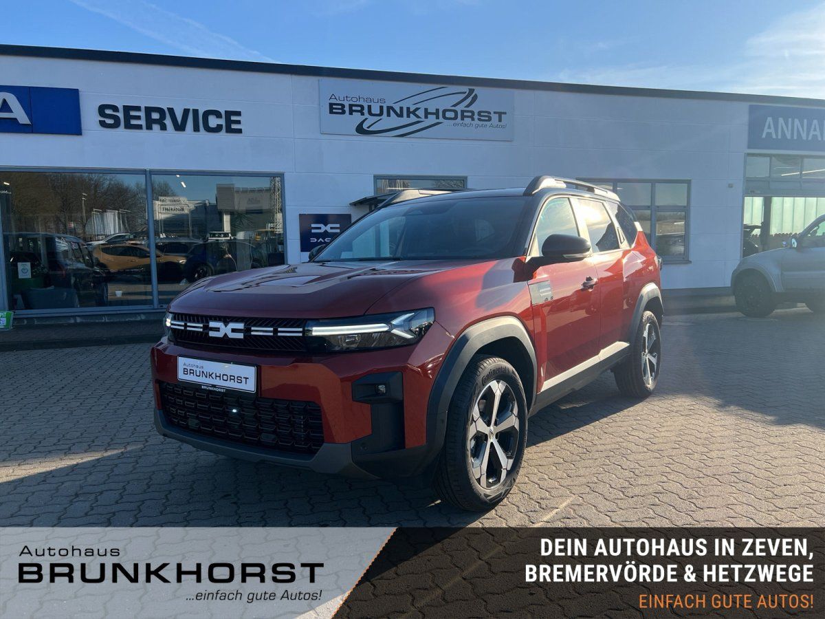 Roter Dacia Bigster SUV Ausstellungsfahrzeug im Autohaus Brunkhorst Showroom - Dreiviertel-Frontansicht
