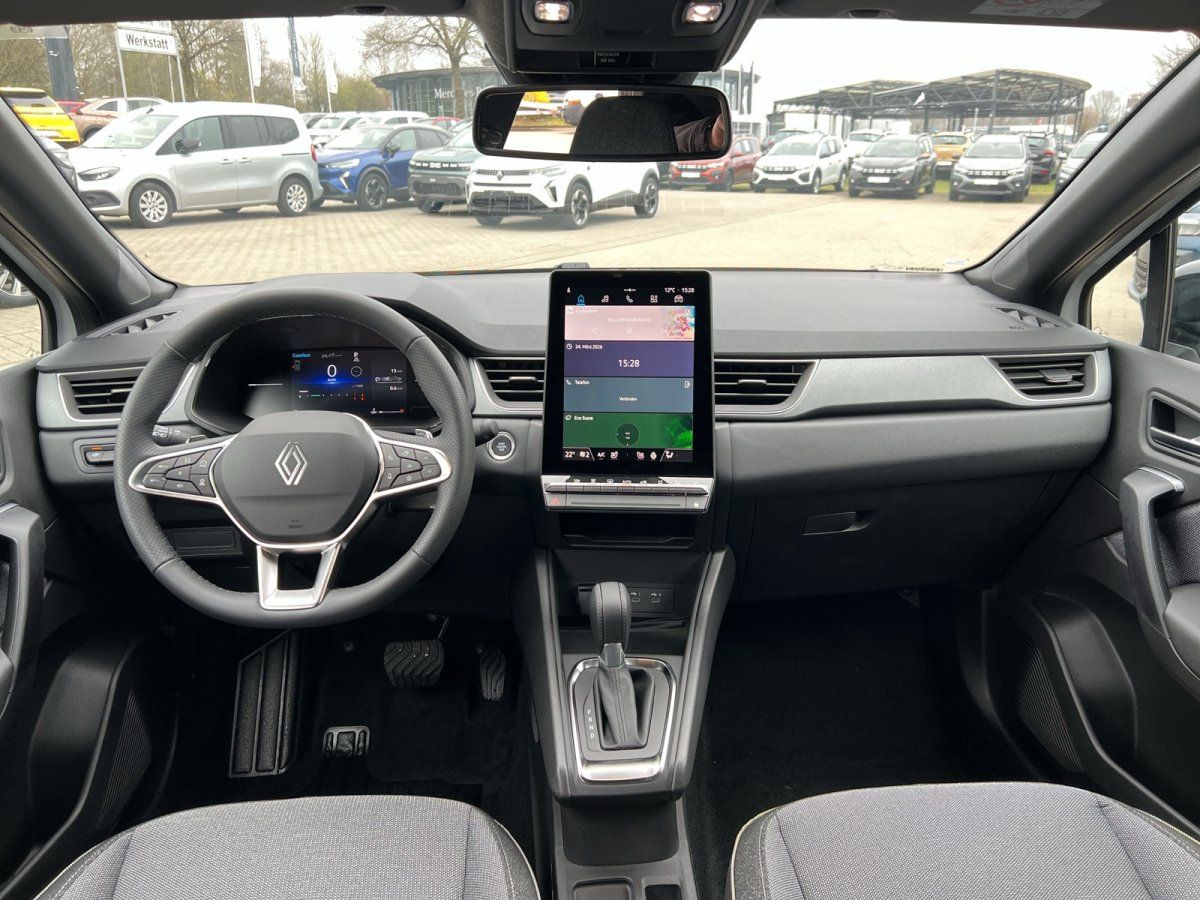Renault Innenraum mit Lenkrad, Touchscreen und Armaturenbrett - moderne Ausstattung