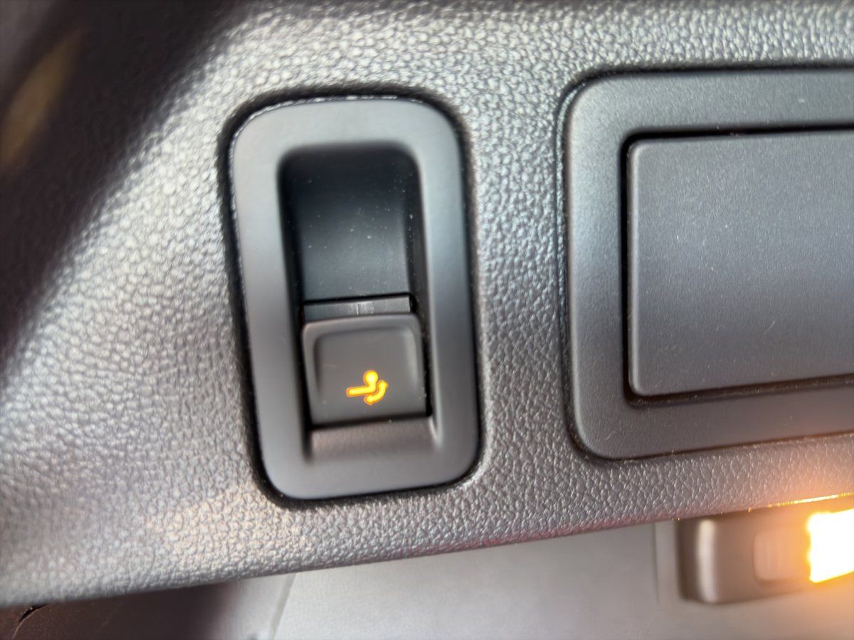 Schalter fuer elektrische Heckklappe im VW Innenraum