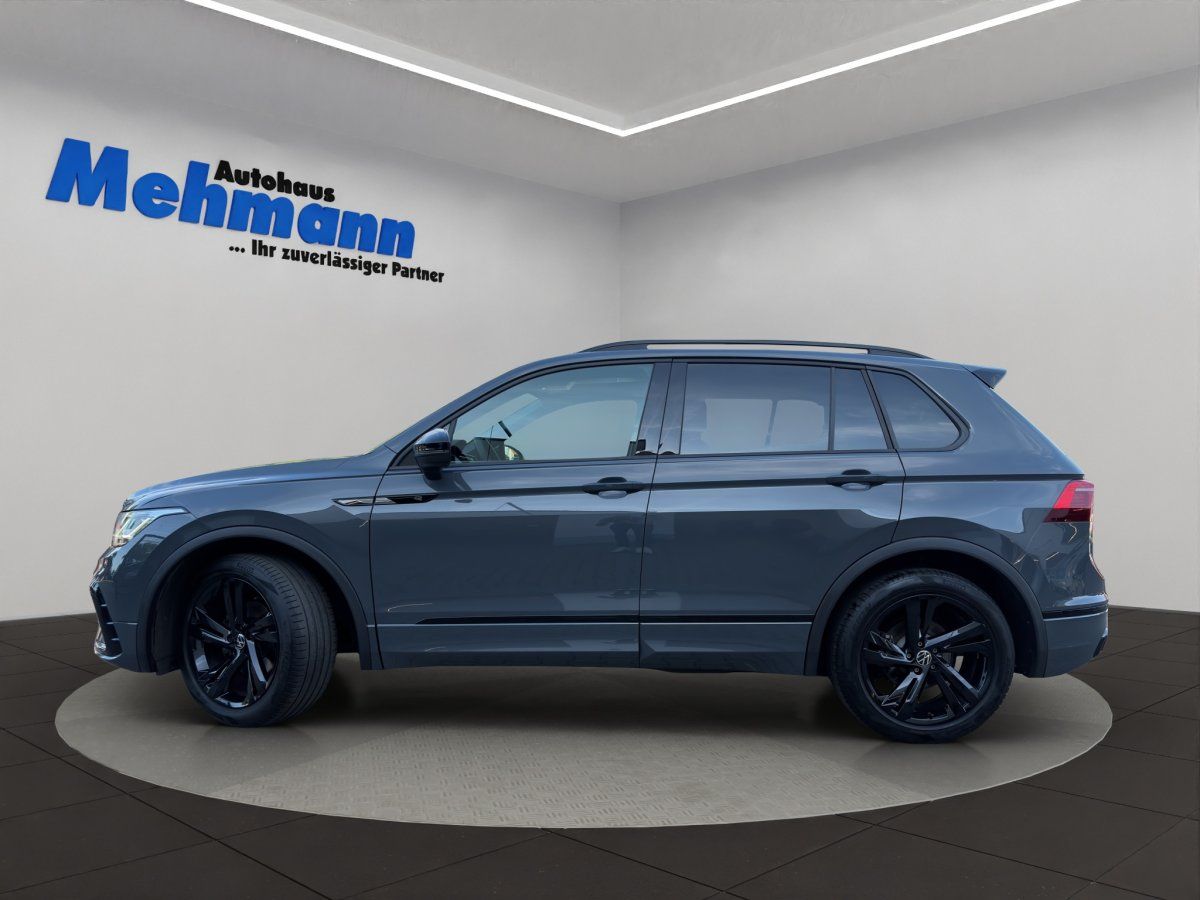 VW Tiguan grau Seitenansicht bei Autohaus Mehmann