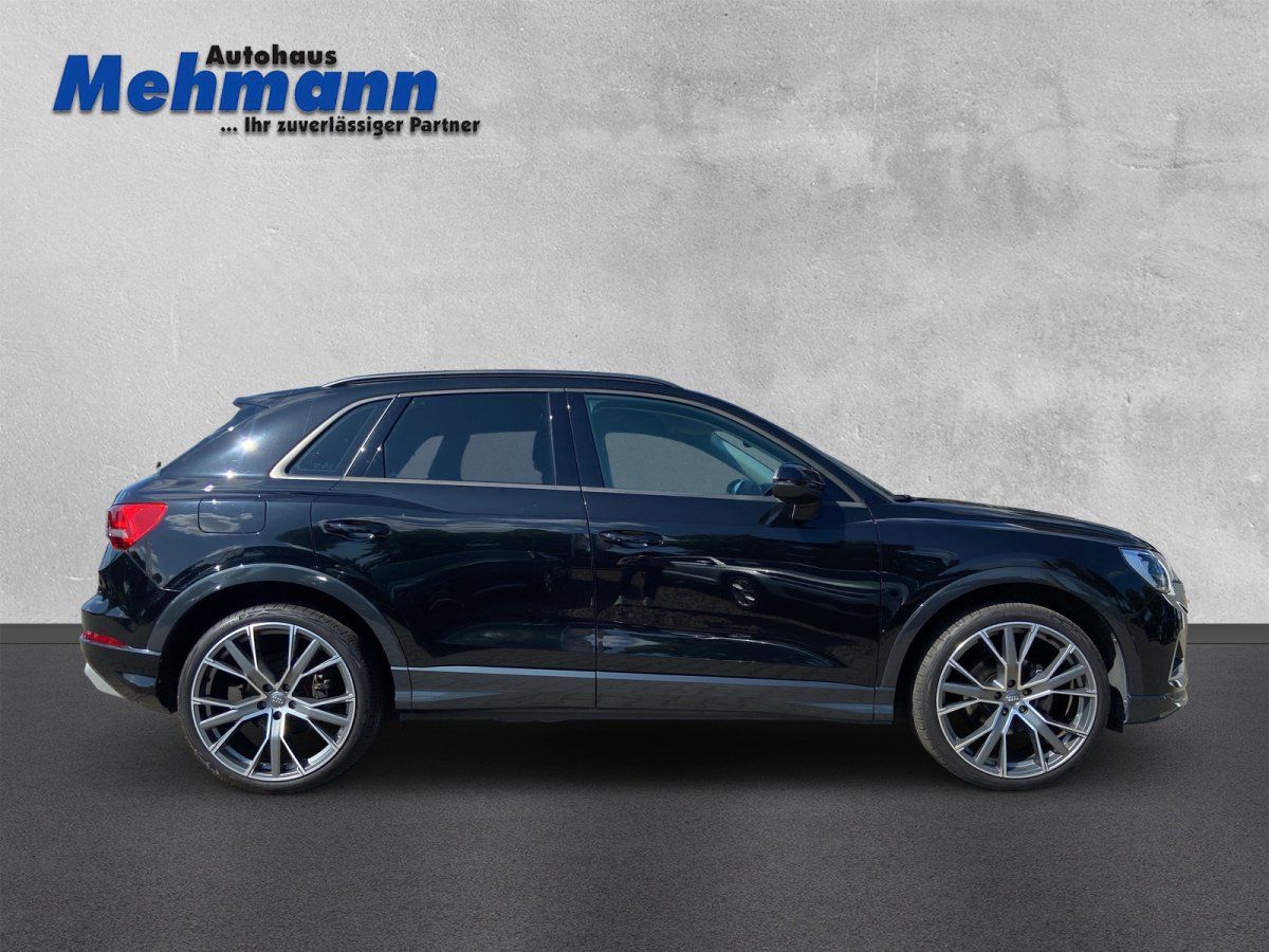 Audi Q3 schwarz Seitenansicht mit Alufelgen - Autohaus Mehmann