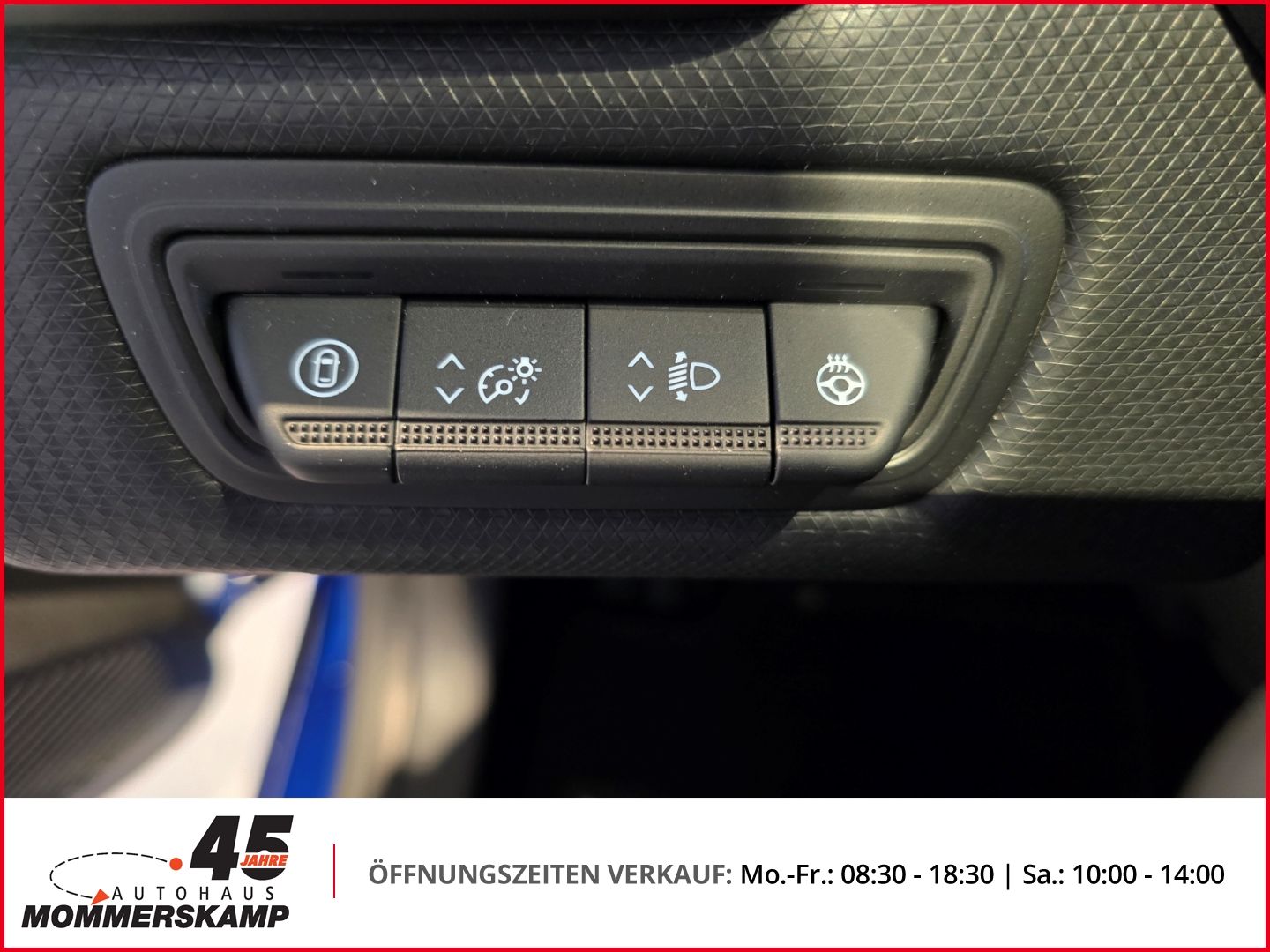 Innenraum Detailansicht Bedienelemente Lenkradheizung und Scheinwerferregulierung