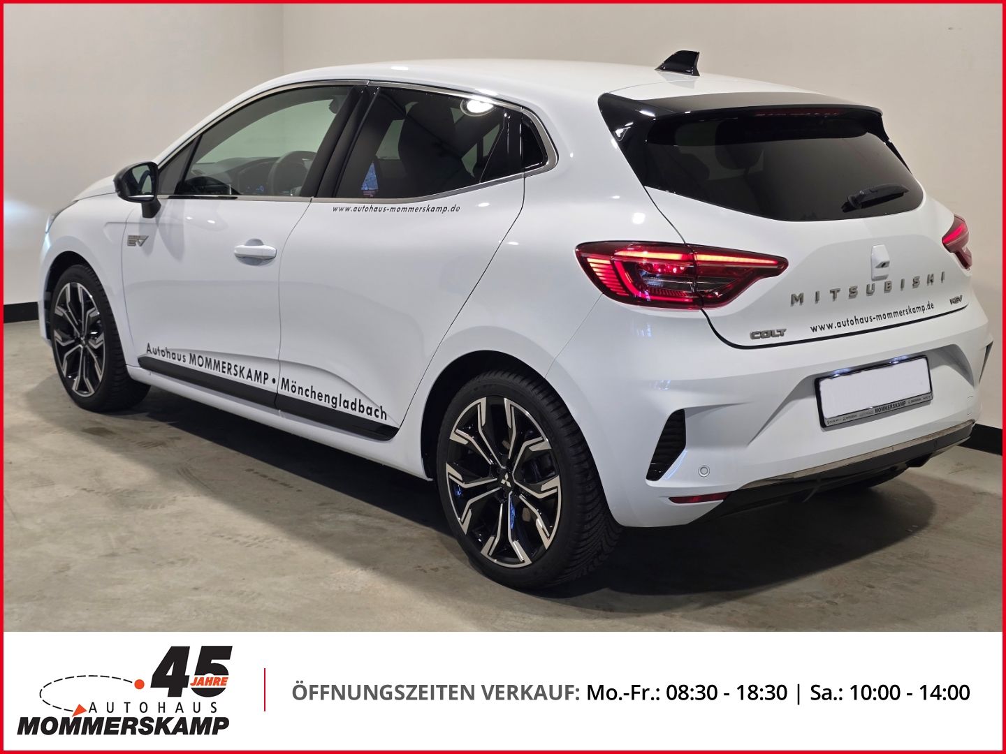Mitsubishi Colt weiß, Heckansicht mit Alufelgen bei Autohaus Mommerskamp