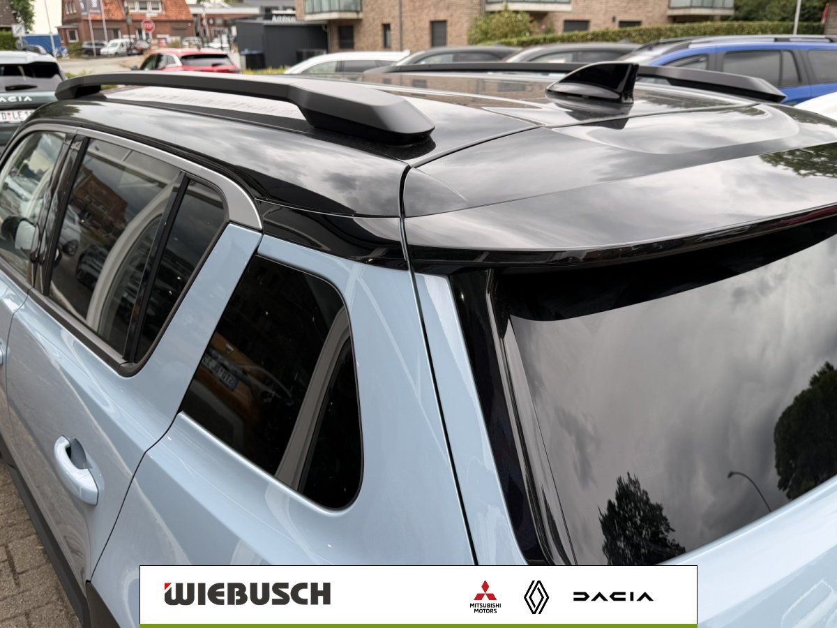 Dachspoiler und Heckfenster eines Renault SUV in Detailansicht