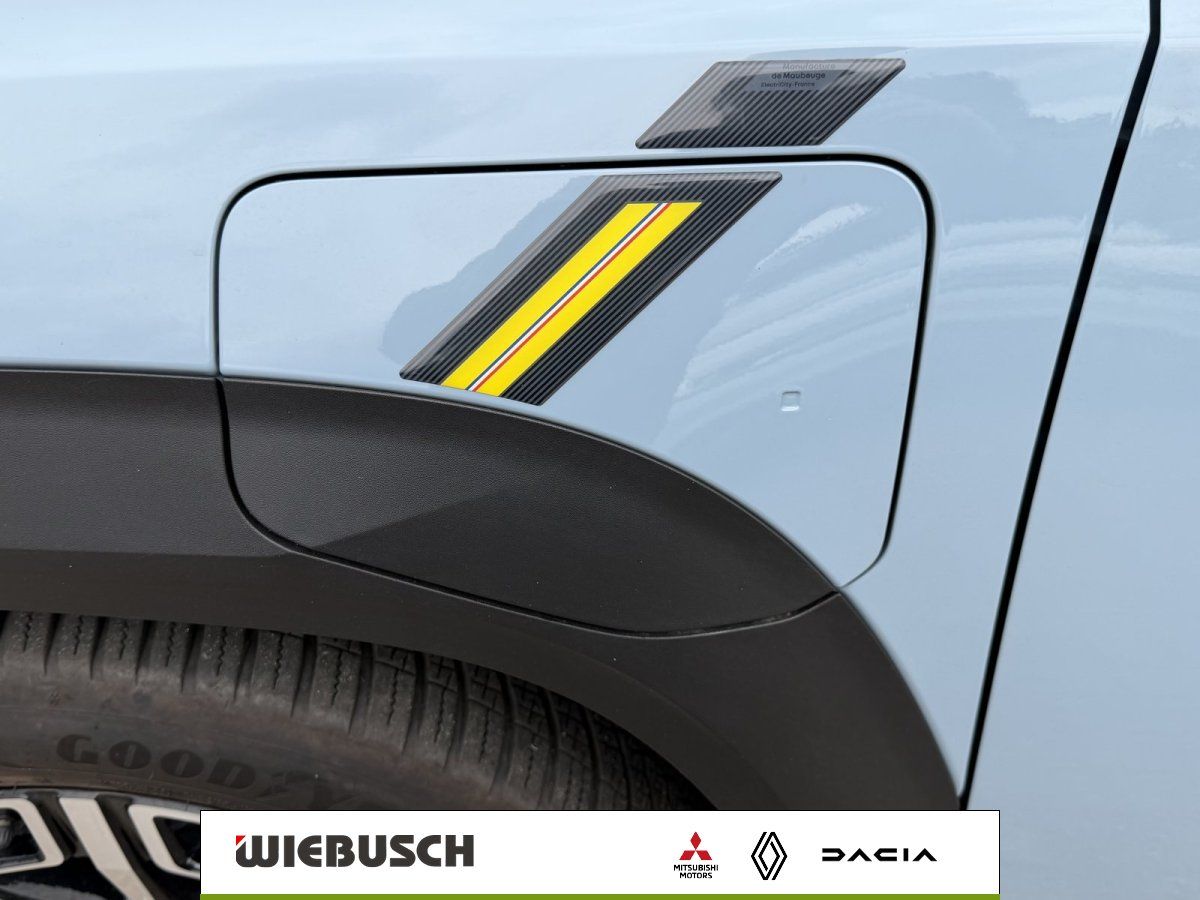 Renault 4 E-Tech Detailansicht Tankdeckel und Zierstreifen
