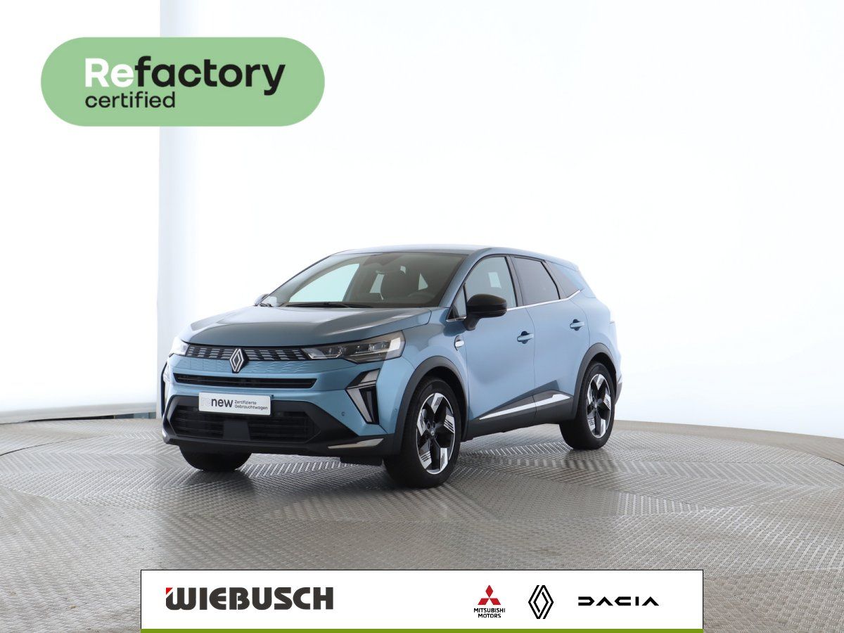 Renault SUV in Blau, Frontansicht schraeg im Showroom
