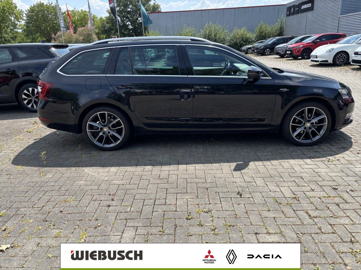 Skoda Octavia Combi schwarz Seitenansicht mit Alufelgen