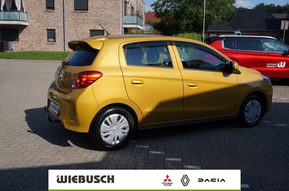 Gelber Mitsubishi Space Star Seitenansicht Heck, Kompaktwagen bei Wiebusch