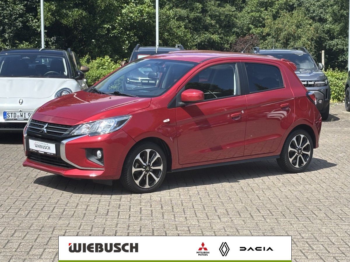 Mitsubishi Space Star rot, Frontansicht seitlich auf Parkplatz