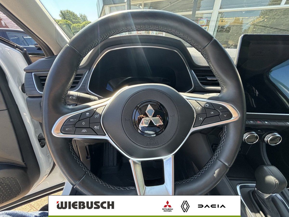 Mitsubishi Lenkrad mit Multifunktionstasten und Airbag im Innenraum
