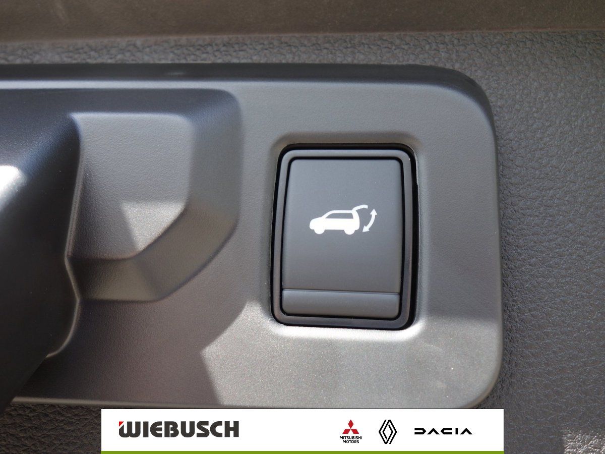 Bedienelement für elektrische Heckklappe im Mitsubishi Innenraum