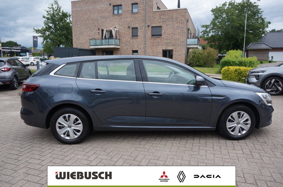 Renault Megane Grandtour Kombi in Grau, Seitenansicht beim Autohaus Wiebusch