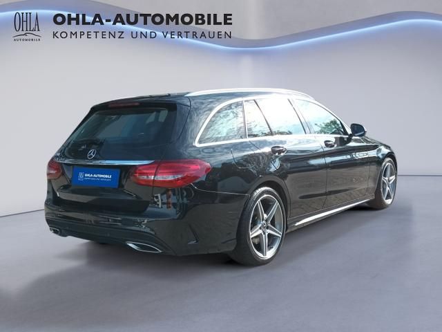Mercedes-Benz C-Klasse Kombi schwarz Heckansicht AMG Felgen