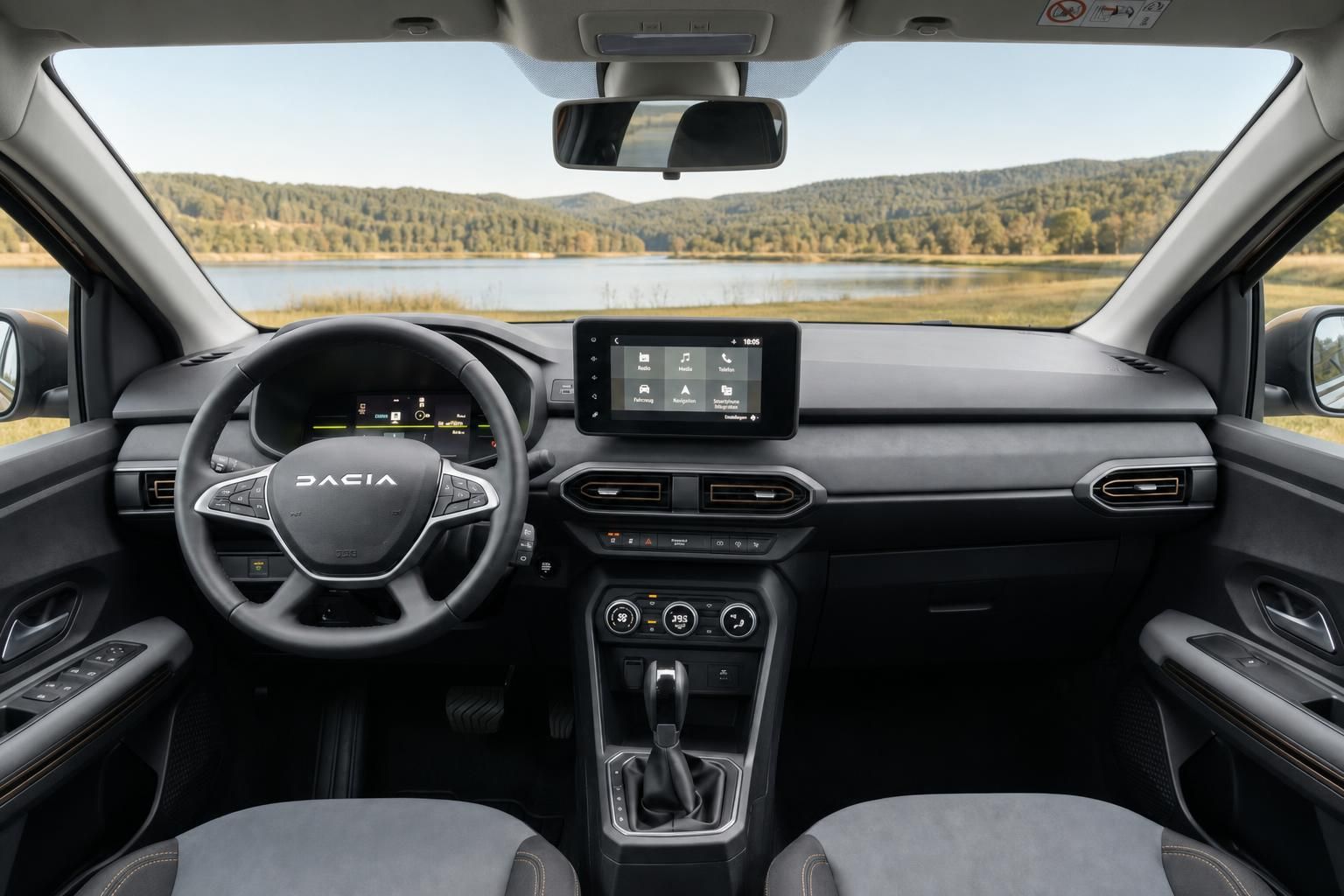 Dacia Armaturenbrett Innenansicht mit Digital-Display, Touchscreen und Landschaftsblick