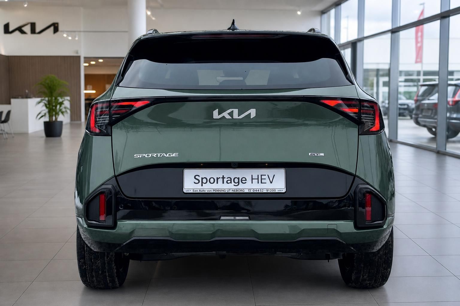 Kia Sportage HEV grün, Heckansicht mit Kennzeichen