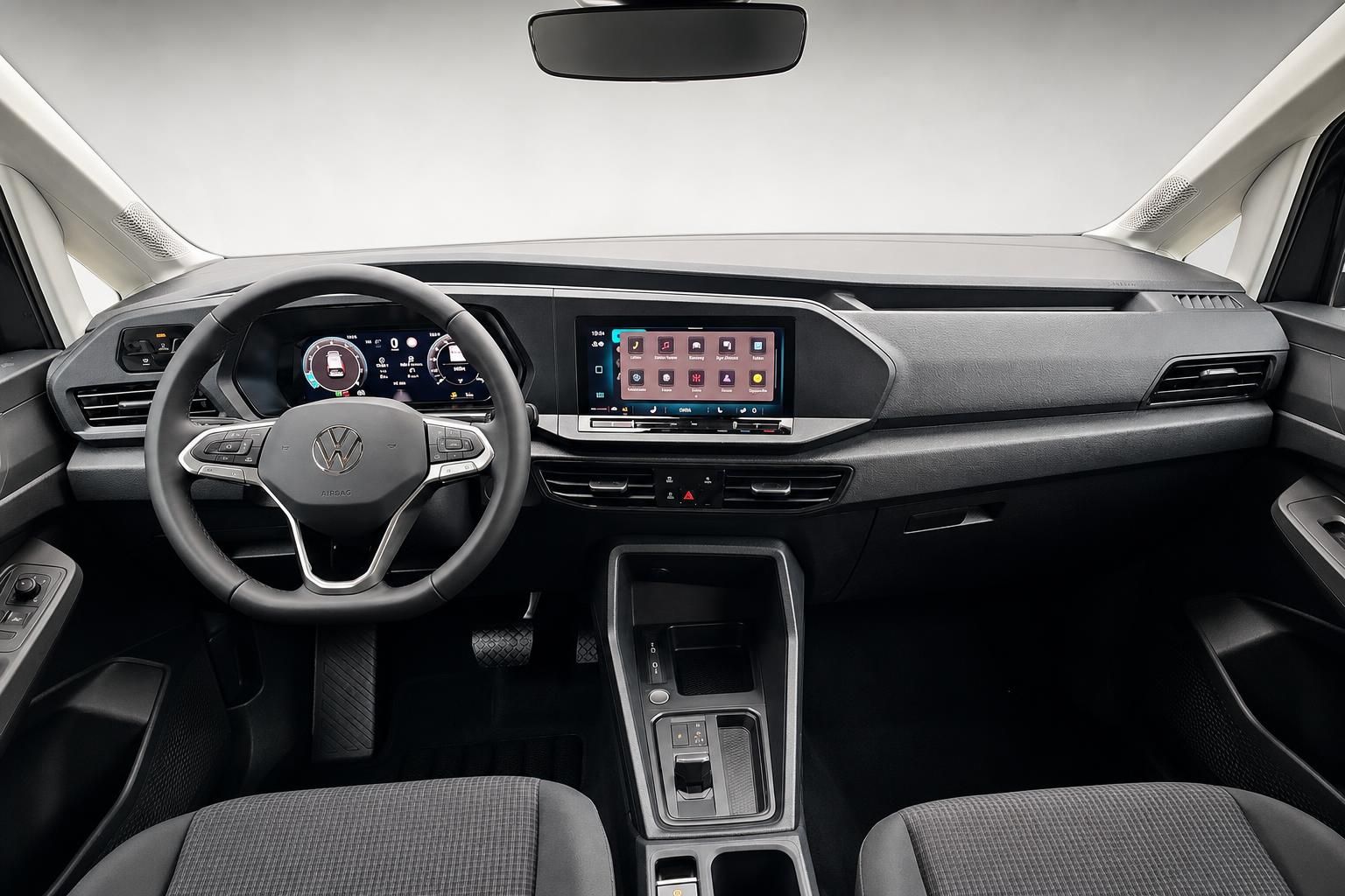 VW Caddy Cockpit mit Lenkrad und Infotainment Display