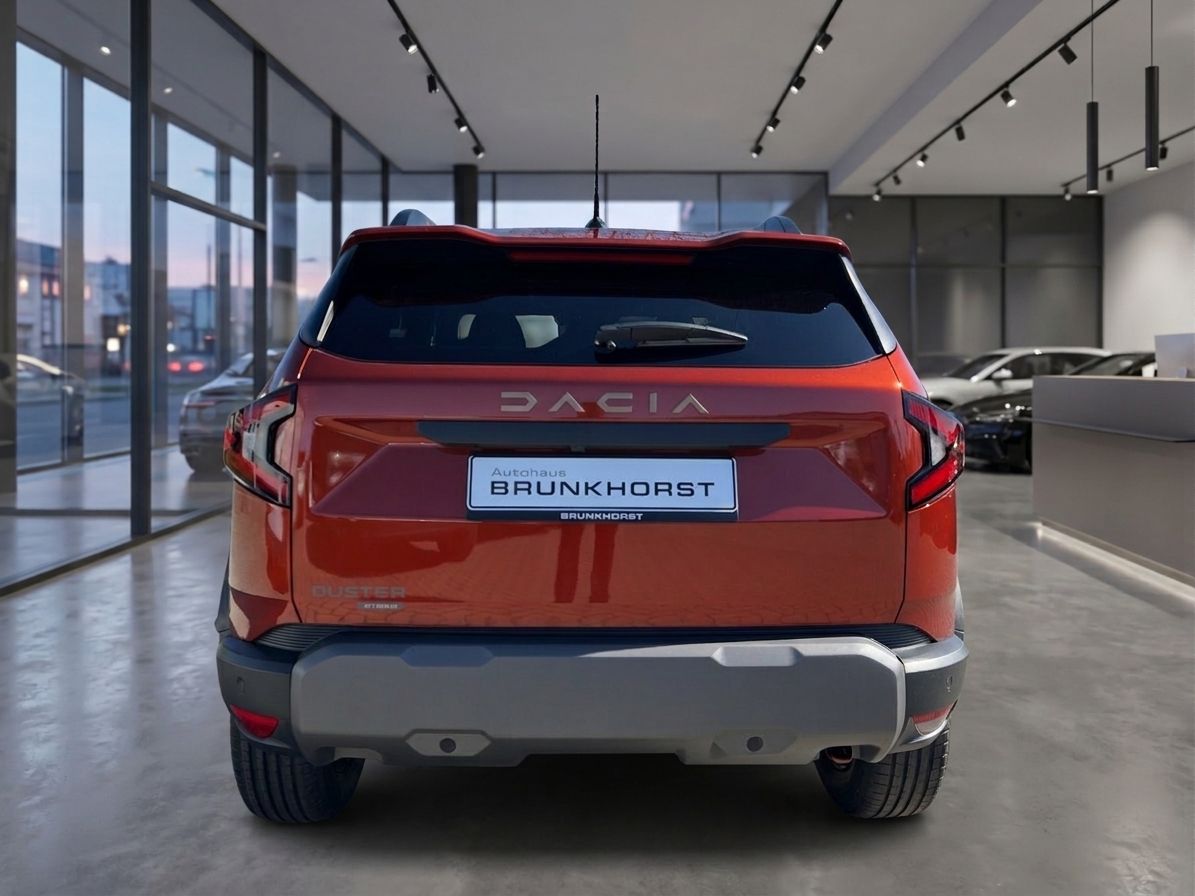 Roter Dacia SUV Heckansicht mit DACIA Schriftzug im Autohaus