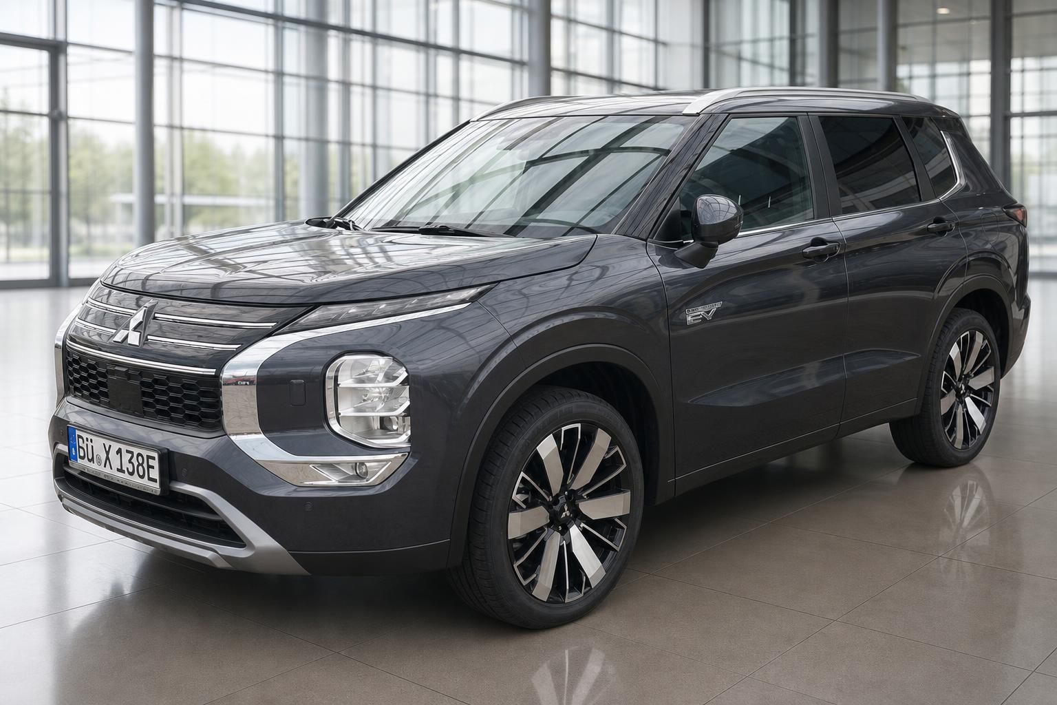 Mitsubishi Outlander PHEV SUV grau Frontansicht schräg im Showroom