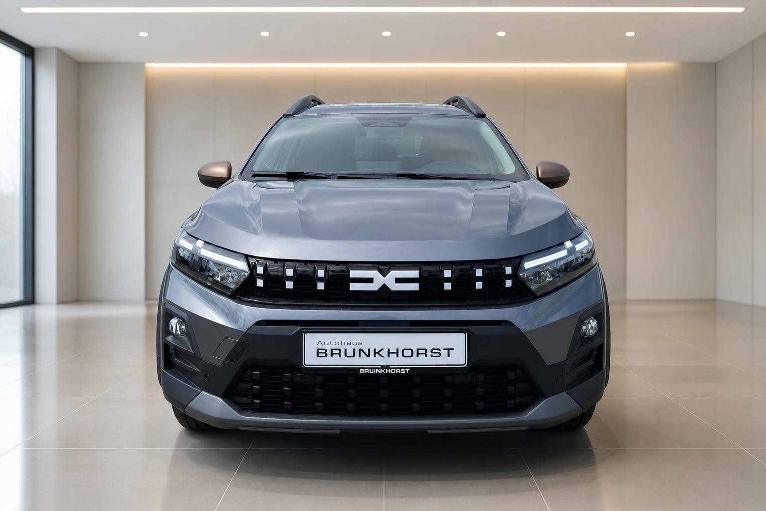Dacia Jogger grau Frontansicht mit LED-Scheinwerfern im Autohaus Brunkhorst