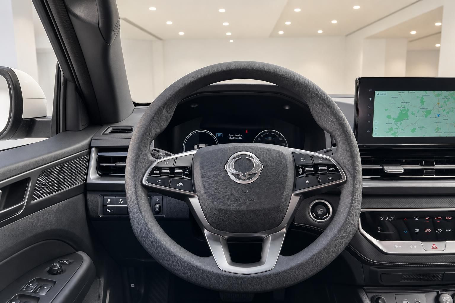 Fahrzeug Cockpit mit Lenkrad, Armaturenbrett und Navigationssystem - Innenraumdetail