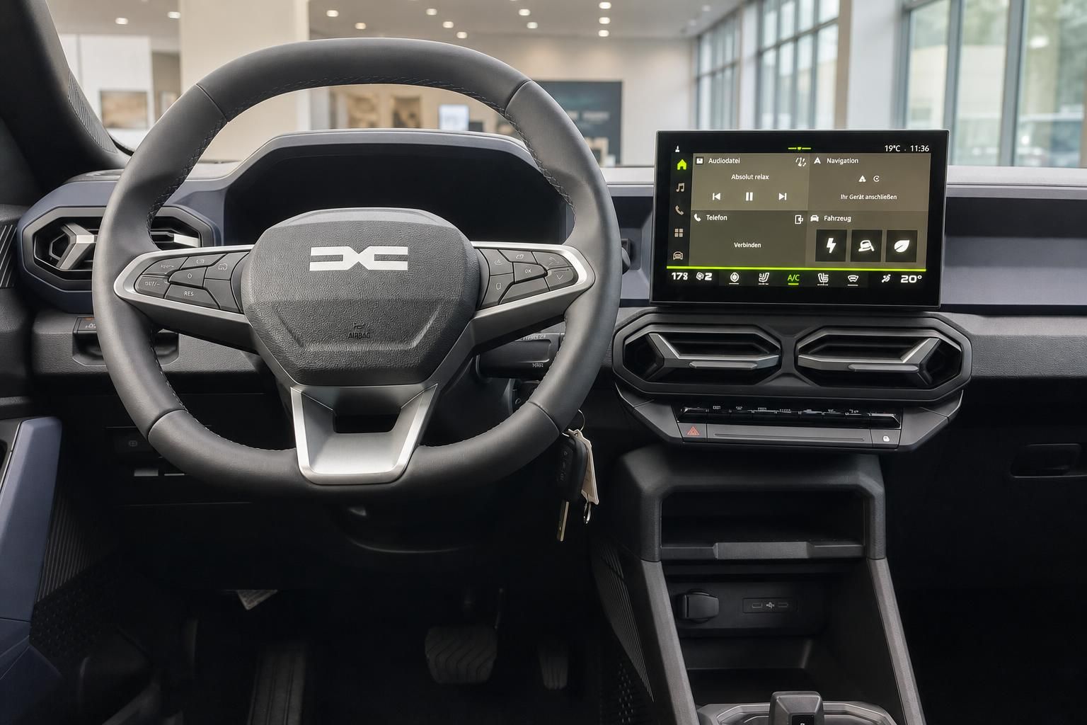 Dacia Bigster Innenraum Cockpit mit Lenkrad und Infotainment-Display