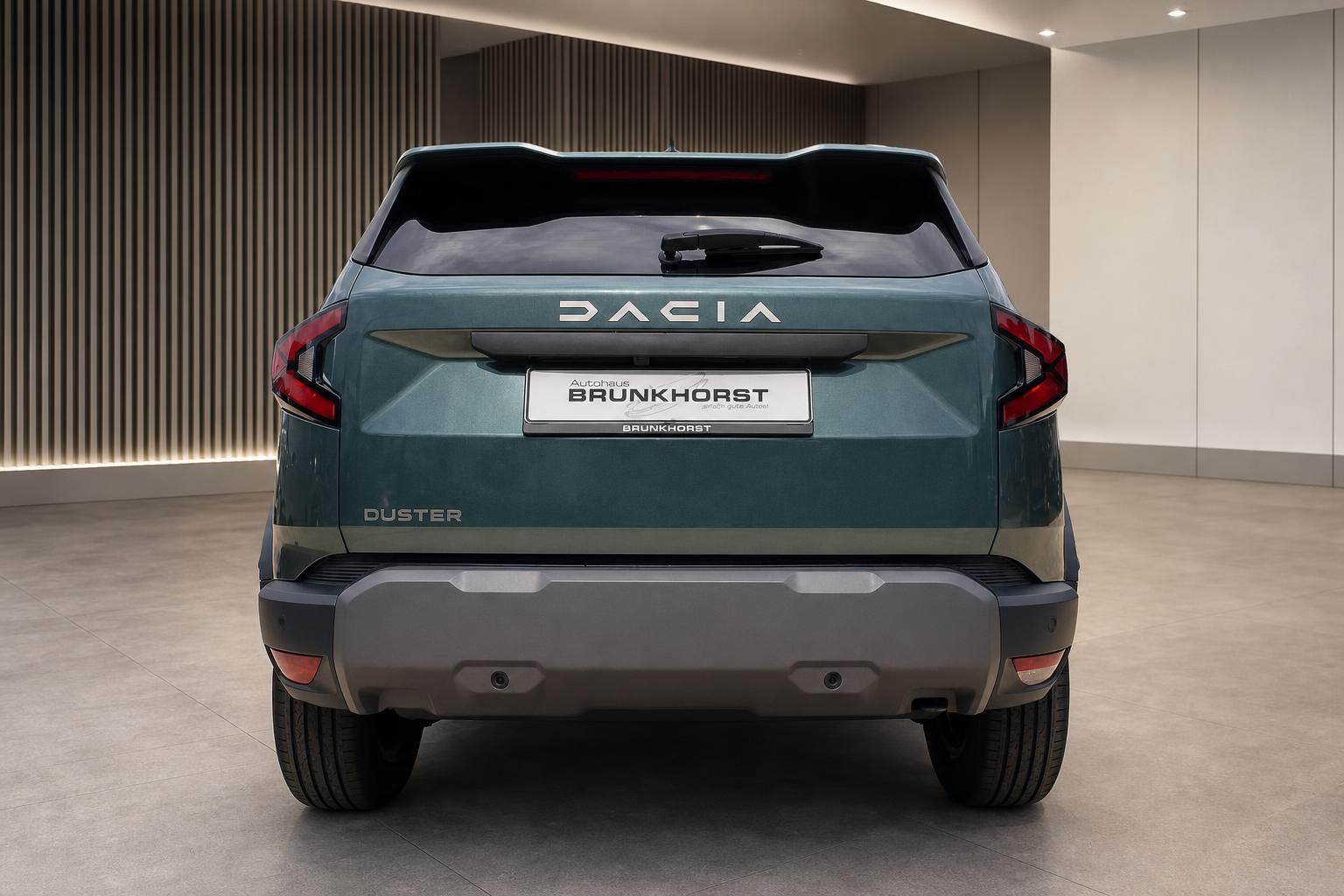 Dacia Duster grün Heckansicht mit Duster Schriftzug