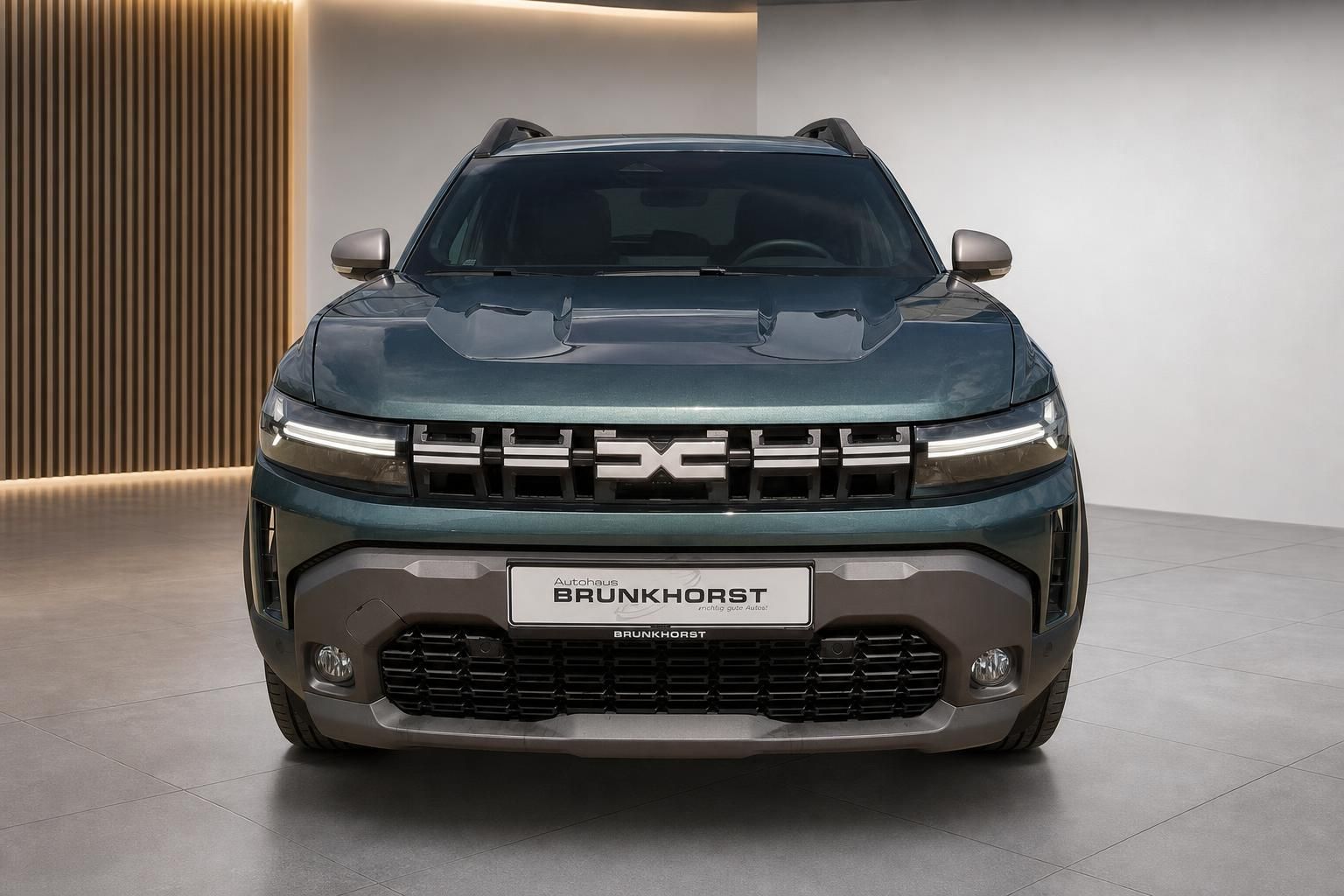 Dacia Duster grün Frontansicht bei Autohaus Brunkhorst