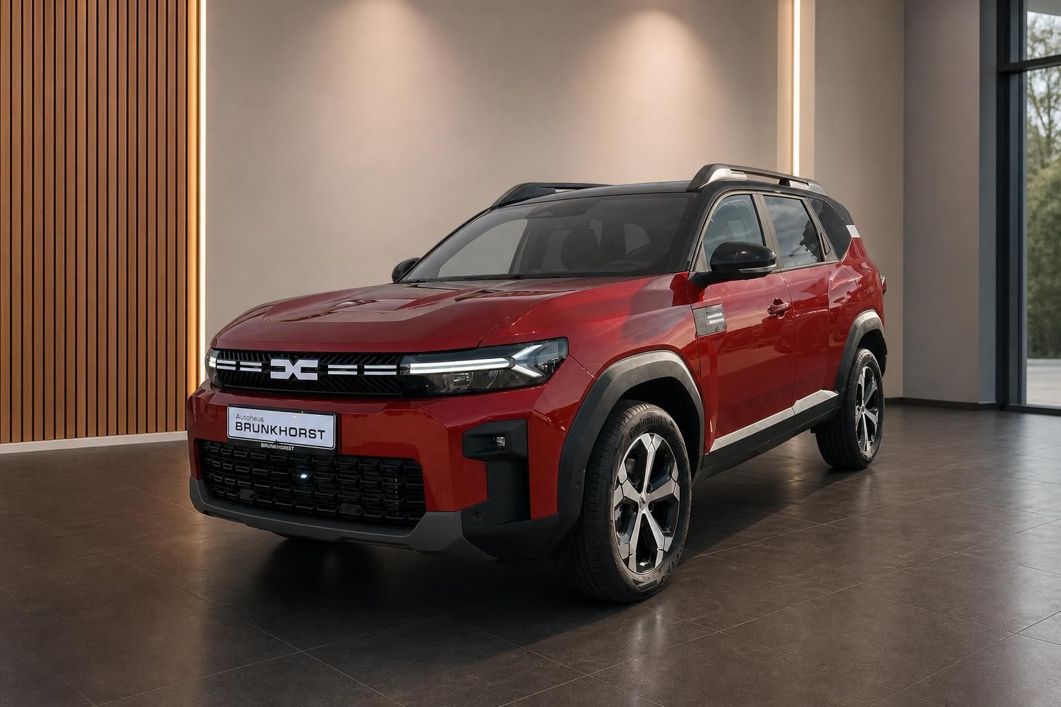 Roter Dacia SUV Bigster im Autohaus - Seitenansicht mit modernem Design und Alufelgen