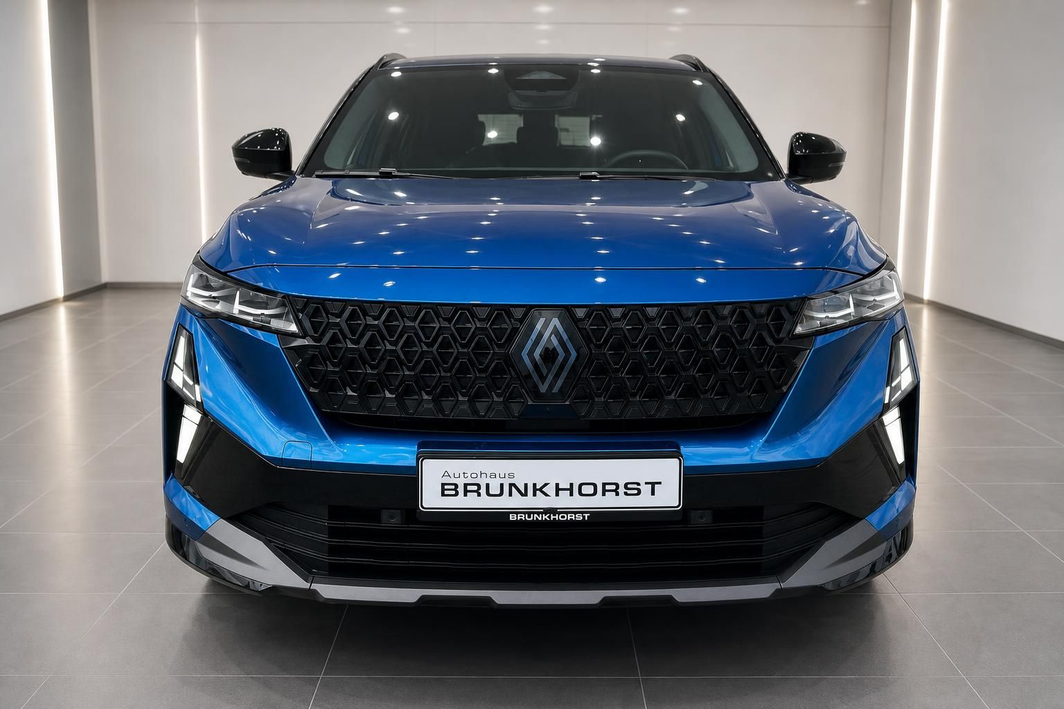 Renault Austral blau, Frontansicht mit LED-Scheinwerfern und Kühlergrill