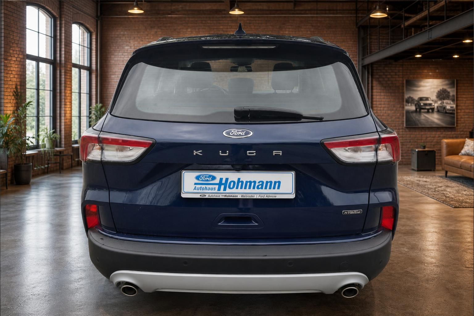 Ford Kuga Hybrid blau Heckansicht mit Kennzeichenhalter Hohmann