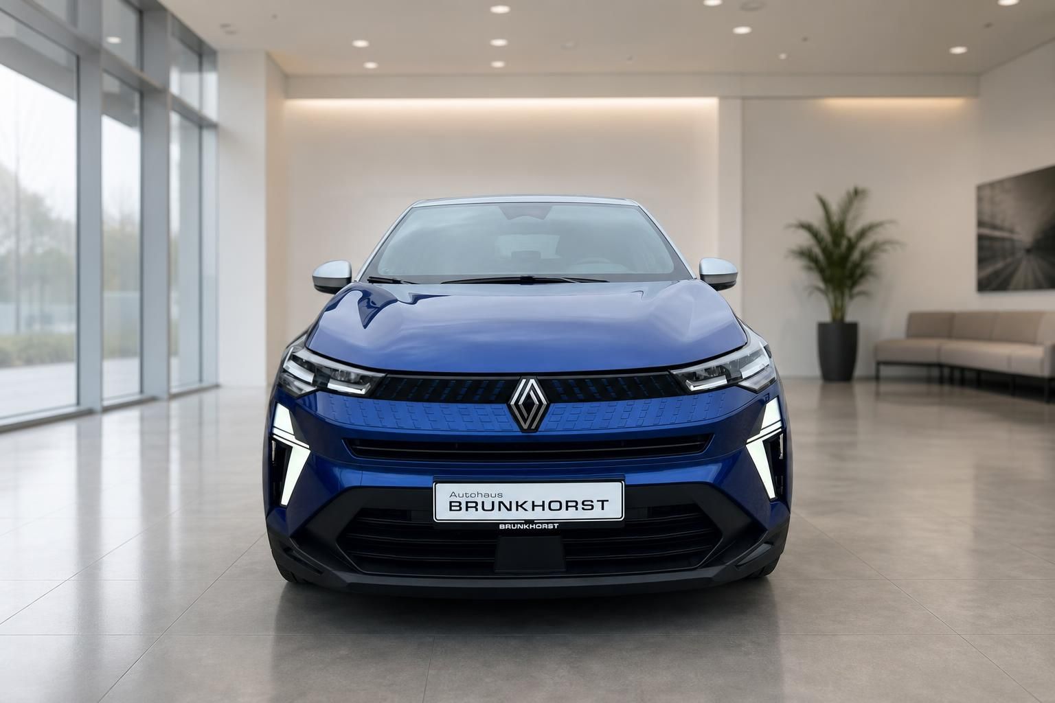 Renault Captur blau Frontansicht mit LED-Scheinwerfern im Autohaus