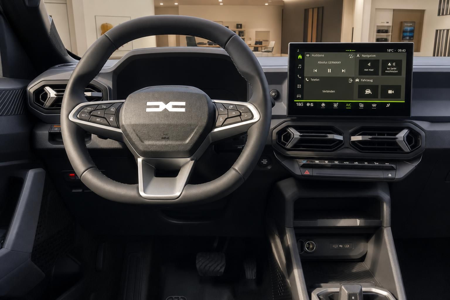 Dacia Duster Innenraum mit Lenkrad und digitalem Infotainment-Display