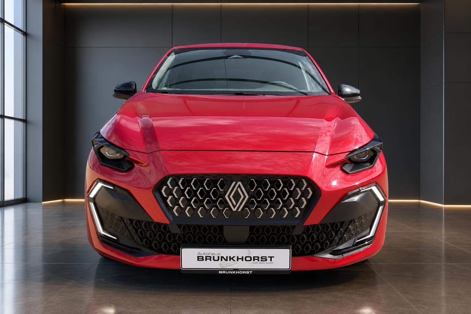 Renault Clio rot, Frontansicht mit Kuehlergrill bei Autohaus Brunkhorst