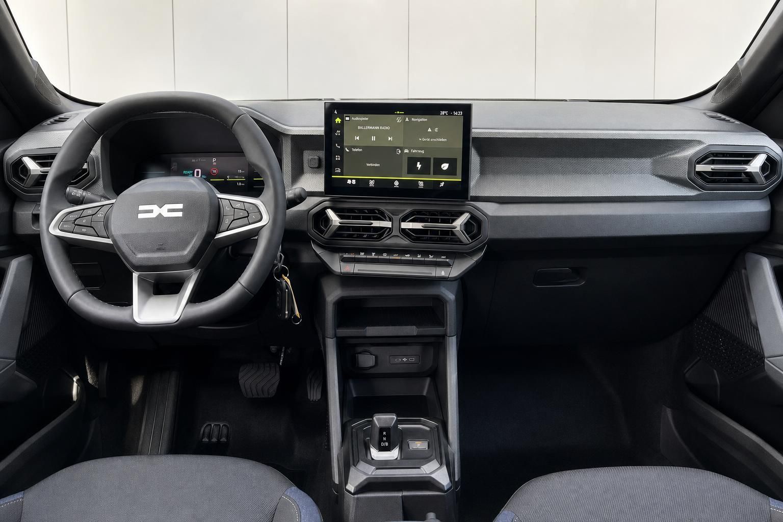 Dacia Duster Armaturenbrett mit Touchscreen Display und modernem Lenkrad Design
