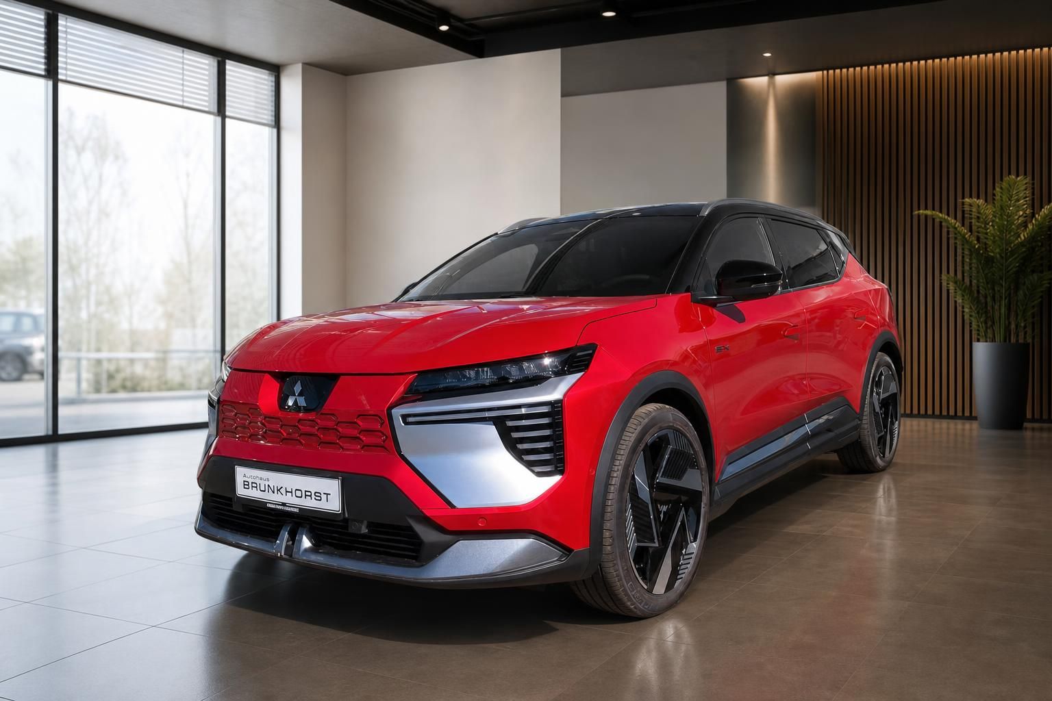 Mitsubishi Eclipse Cross EV in rot-schwarz, Frontansicht im Autohaus Brunkhorst Showroom