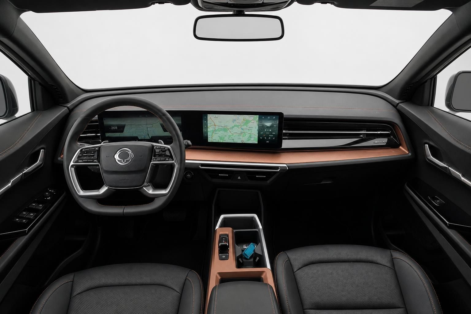 Innenraum KGM Torres EVX mit Cockpit, Lenkrad und Touchscreen