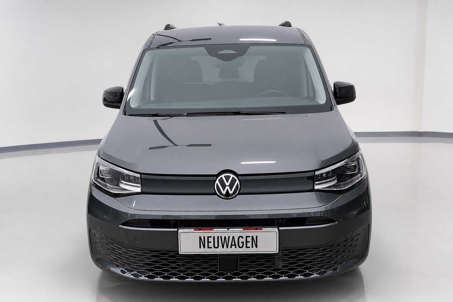 VW Caddy Neuwagen grau Frontansicht Studio