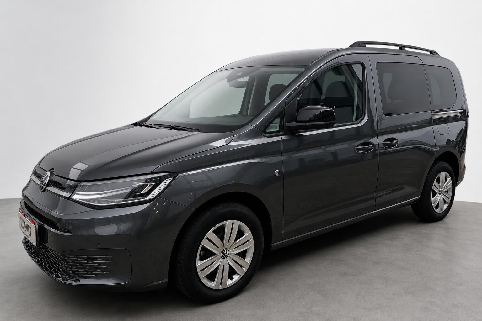 VW Caddy grau Seitenansicht Neuwagen im Studio