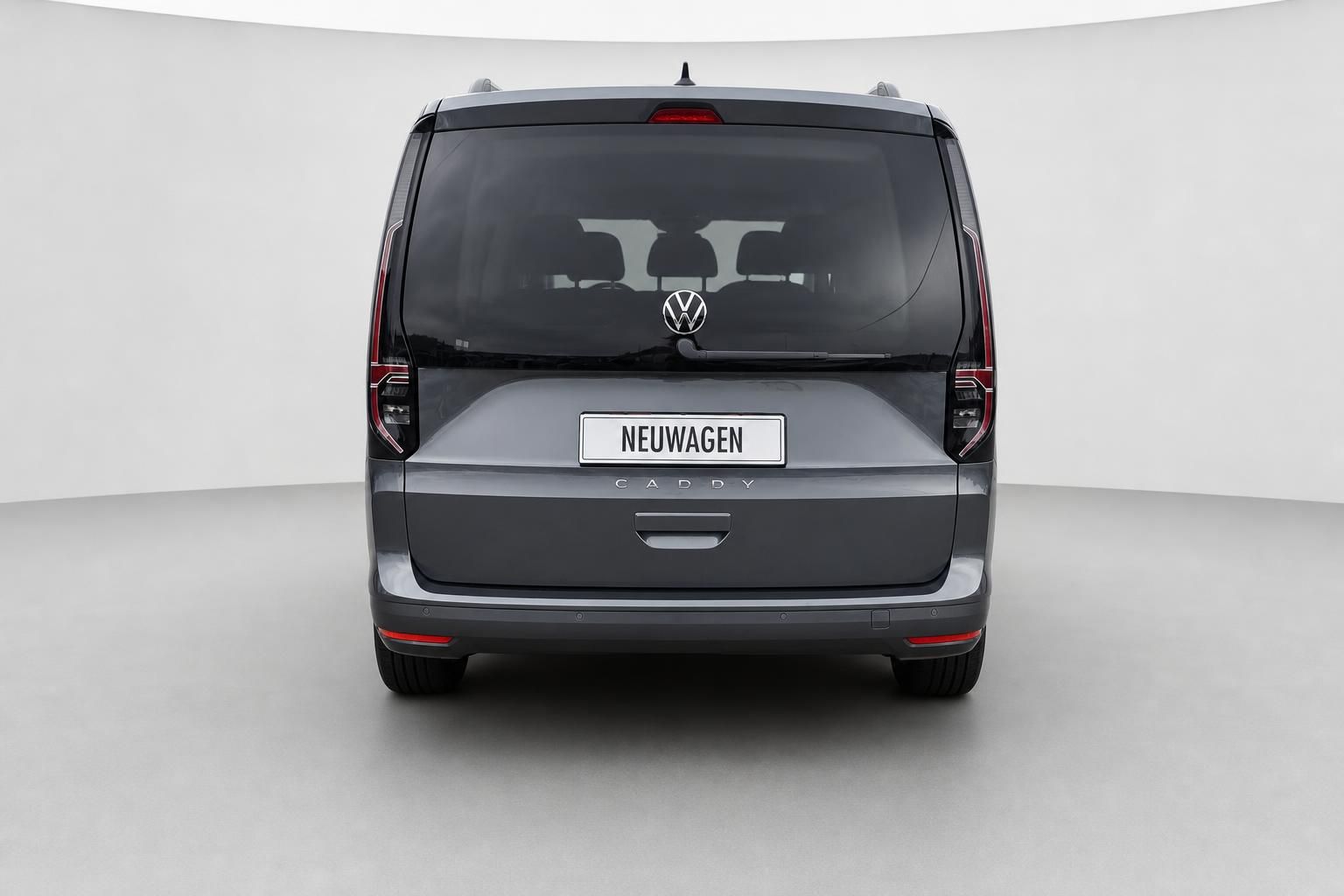 VW Caddy grau Heckansicht mit Kennzeichen Neuwagen
