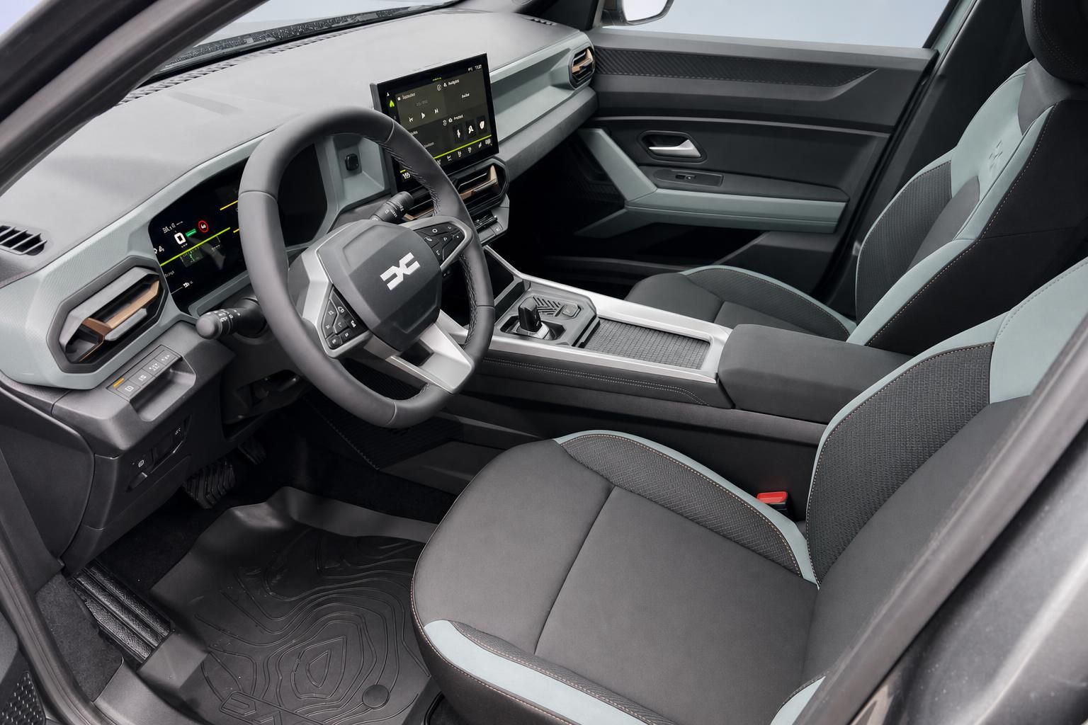 Dacia Cockpit mit digitalen Instrumenten und zweifarbiger Sitzausstattung