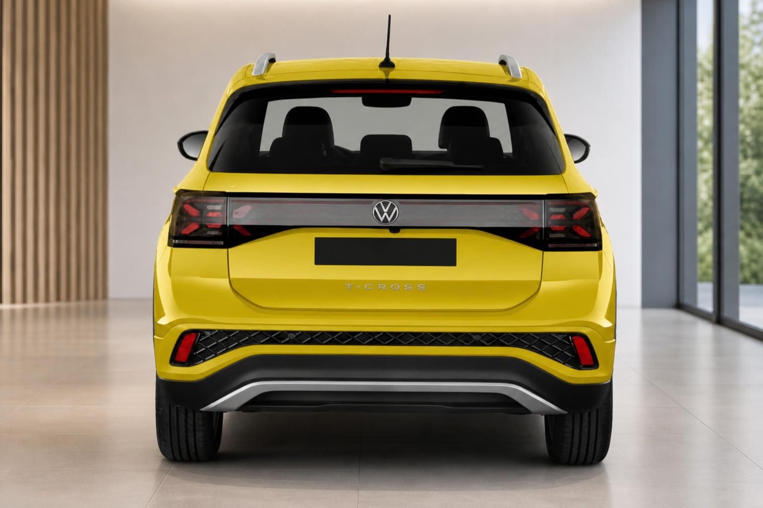 VW T-Cross gelb Heckansicht mit LED-Rückleuchten im Showroom