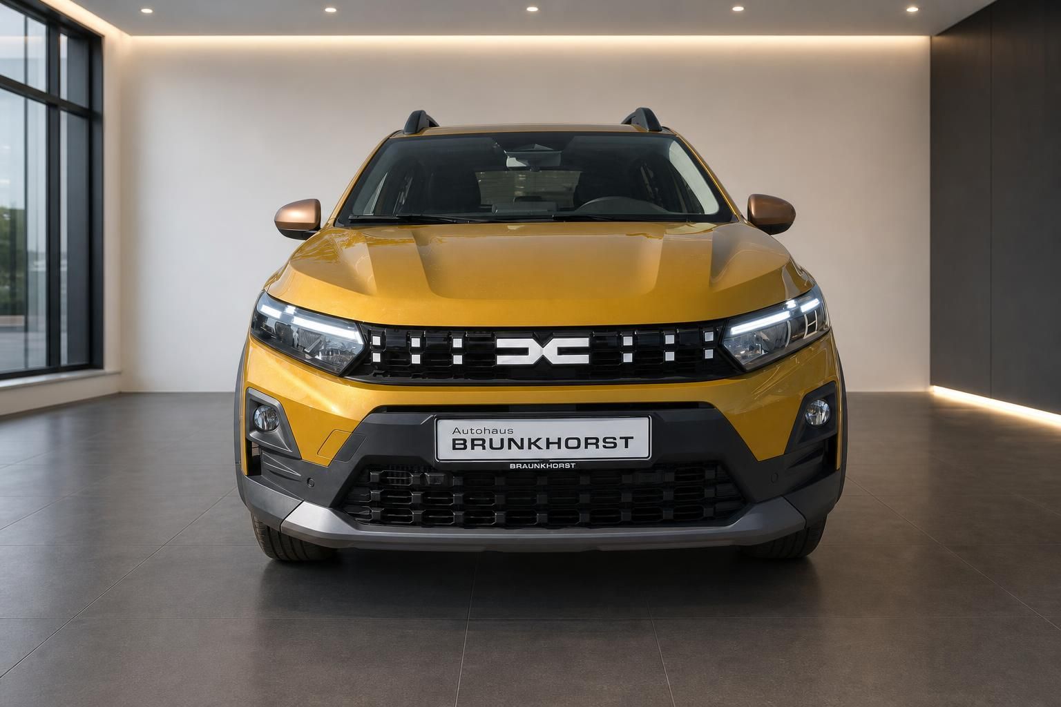 Dacia Sandero Stepway gelb Frontansicht im Autohaus Brunkhorst