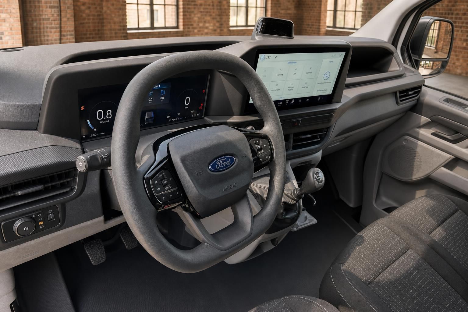 Ford Transit Innenraum mit Lenkrad, digitalem Kombiinstrument und großem Touchscreen
