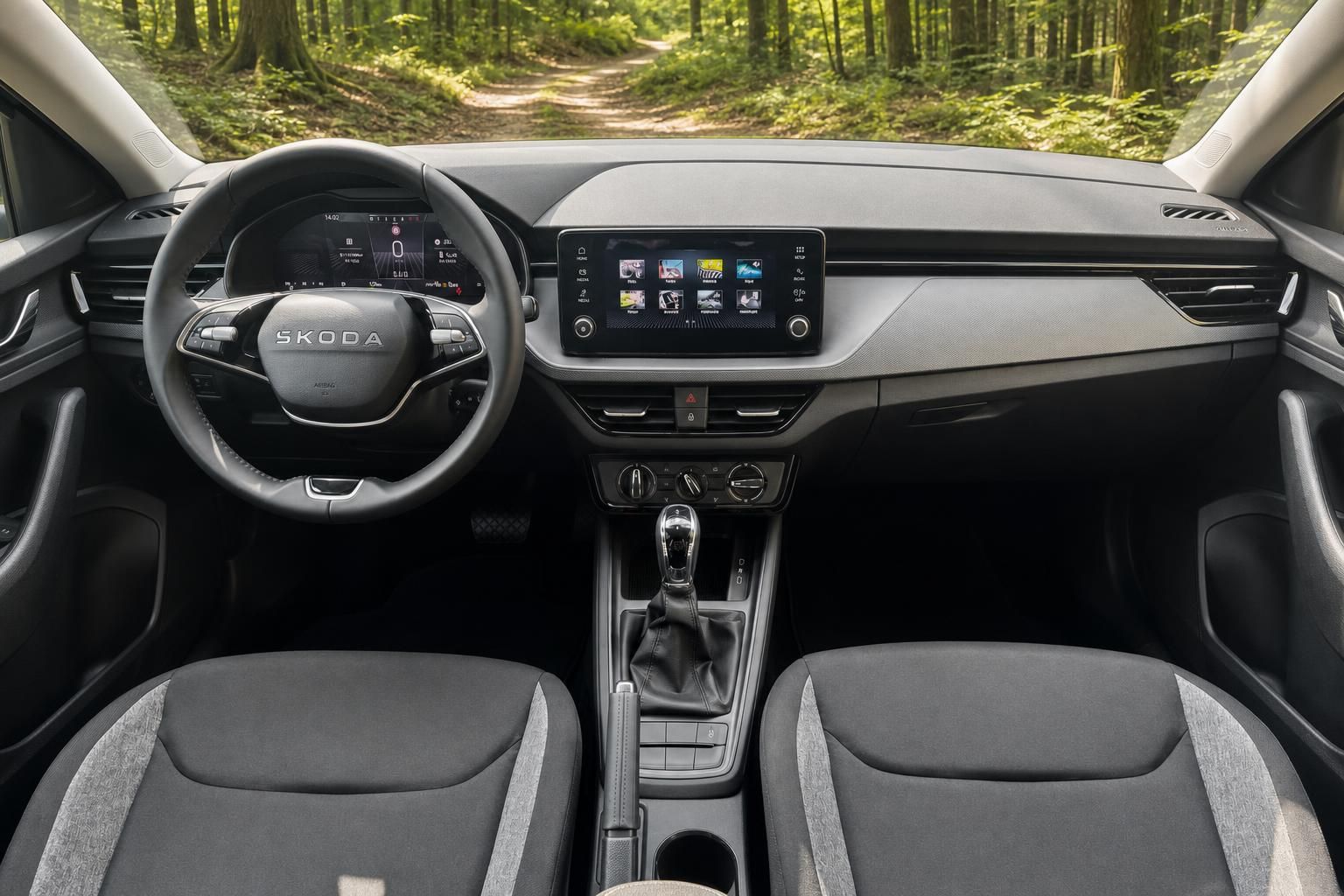 Skoda Kamiq Cockpit mit digitalen Instrumenten, Touchscreen-Infotainment und Skoda-Lenkrad im Detail